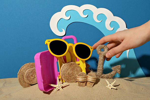 Concept of summer vacation, suitcase and other accessories.