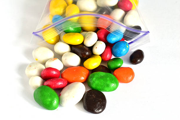 istock Dragee candies with raisins inside in different colors. 2211251532