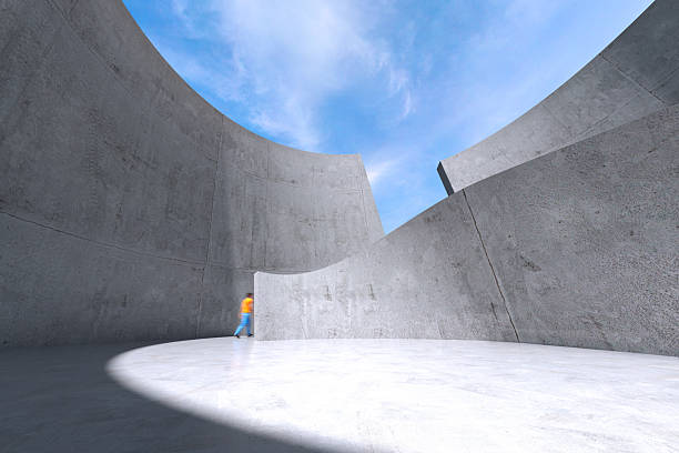 istock Walking out from a abstract concrete environment 2211254711