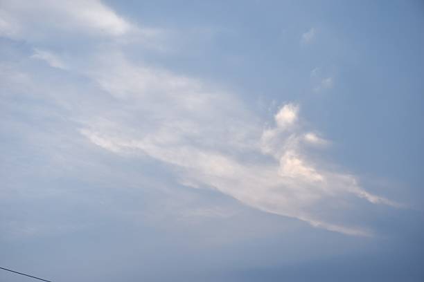 istock white and dark rain cloud floating on sky 2211256984