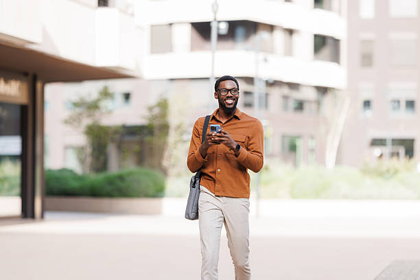 istock Smiling Black businessman on the move 2211257213