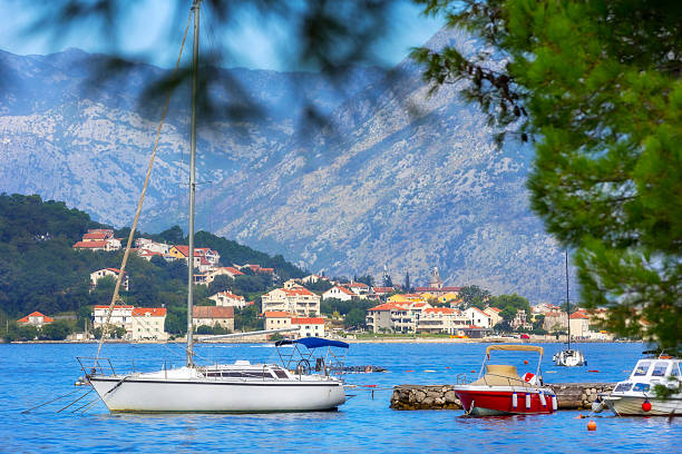 istock Kotor, Montenegro boats and high mountains 2211258675