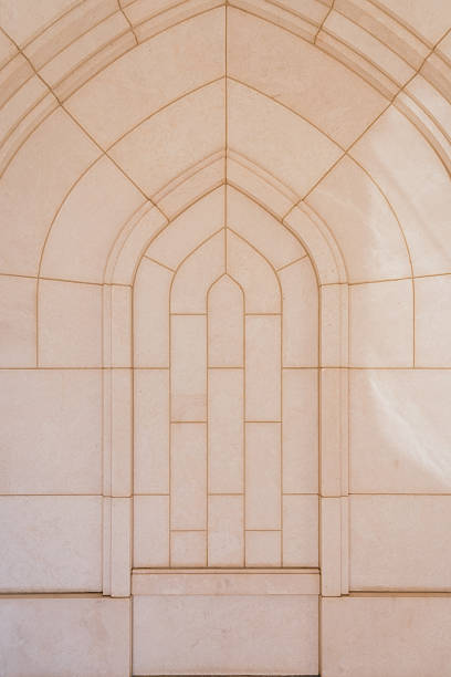White curves in arched roof of arcade