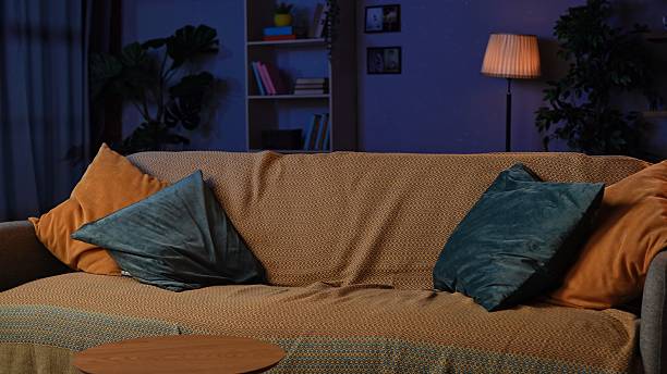 istock Cozy living room interior at night 2211261617