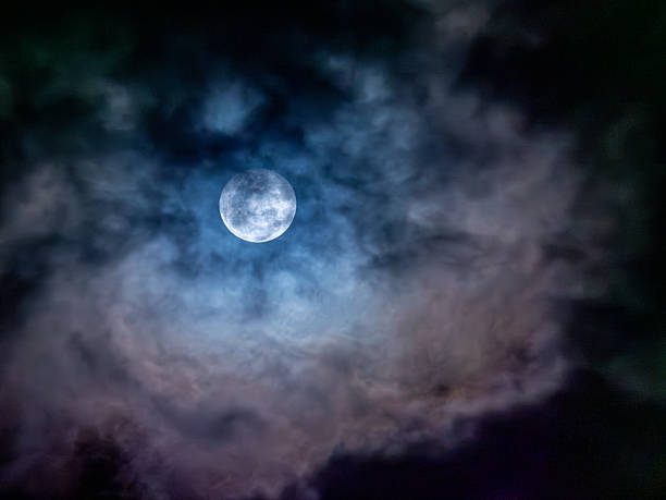 istock Moon Amidst the Veil of Clouds 2211264993