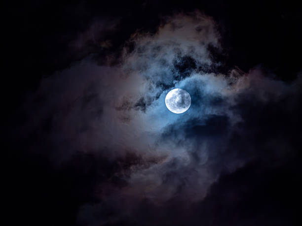 istock Moon Amidst the Veil of Clouds 2211265028