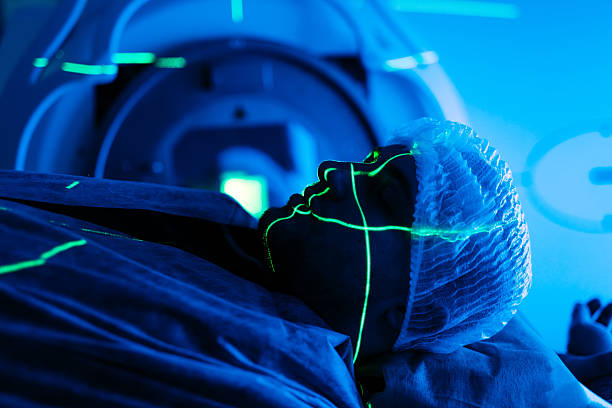 istock A young male undergoing radiation therapy for cancer. 2211269444