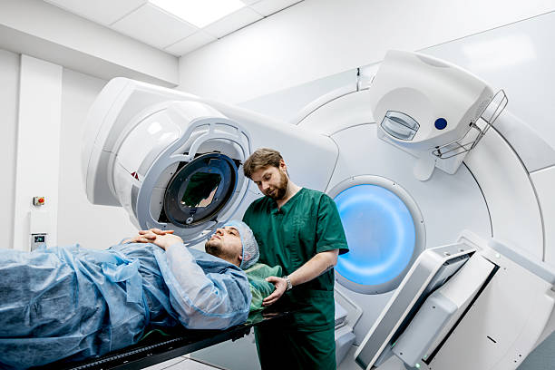 istock In a modern oncology clinic, a man is prepared for radiation therapy on a modern linear accelerator. 2211269456