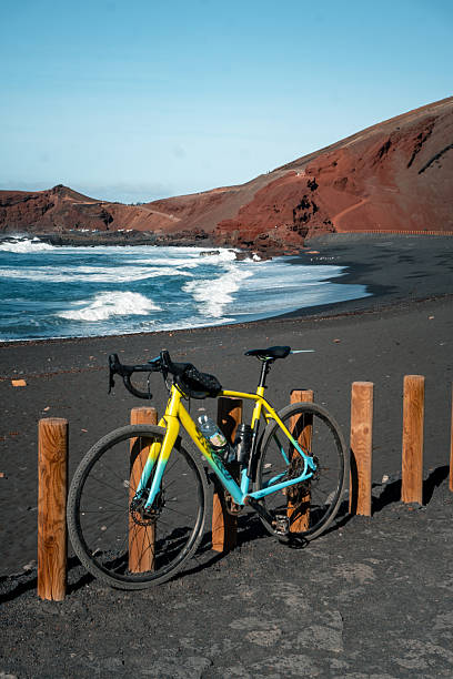 Scenic view of parked bicycle at water's edge, bikepacking around Lanzarote, Canary Islands