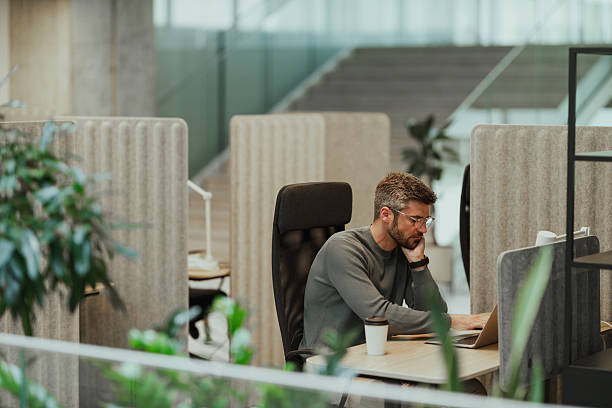 istock Modern Businessman Working in Contemporary Office Space 2211270915