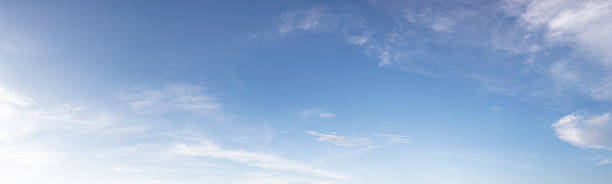 istock Sky vivid cyan white cirrus clouds soft gradient beauty spring bright blue sky fluffy clouds calm background sunshine light landscape gloomy weather gradient fade clear view horizon nature light wide cloudscape. 2211271033
