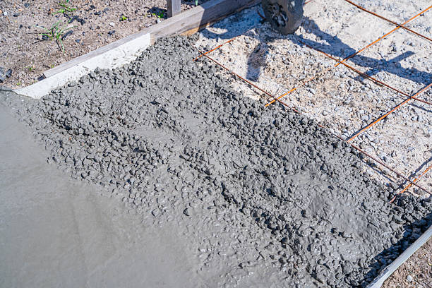 istock The process of pouring concrete on a path on a sunny day, close-up 2211274132