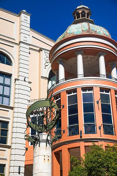 istock Architectural detail with dome and sculpture against blue sky. 2211276627