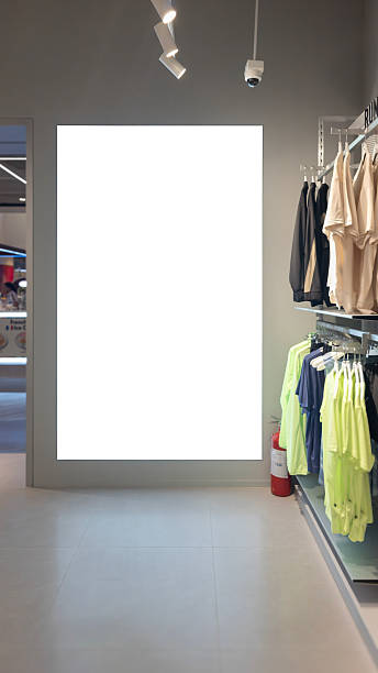 istock Billboard Mockup Blank White Advertising Display Inside Modern Sportswear Retail Store for Promotion 2211281030