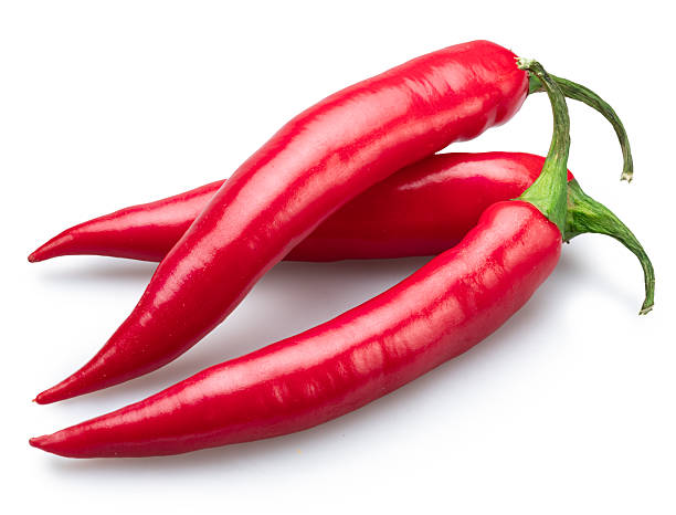 istock Three red hot chilli pepper isolated on white background. File contains clipping path. 2211286159