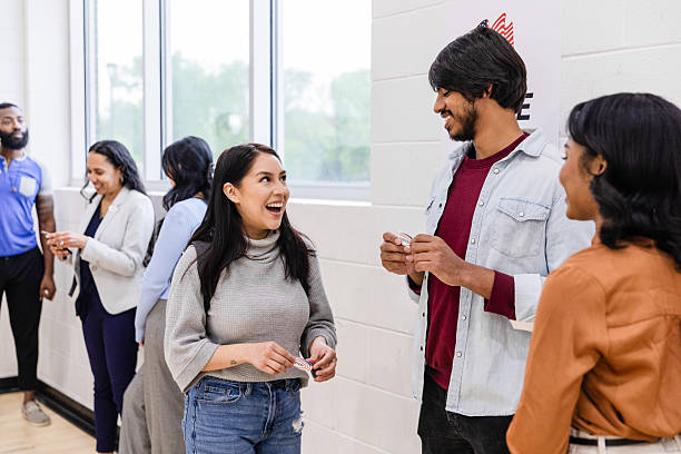 istock Happy Diverse People Talking and Smiling Indoors 2211291648