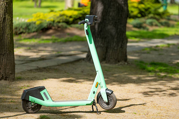 istock green scooterin the park 2211293172