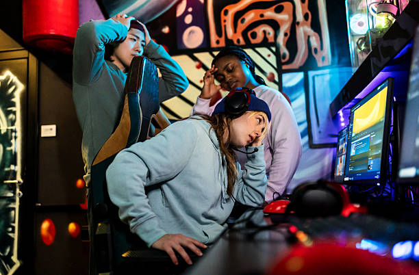 istock Stressed gamers feeling frustrated while playing video games 2211304887
