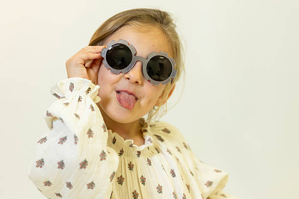 istock Happy caucasian children posing and playing in commercial studio with copy space 2211306042