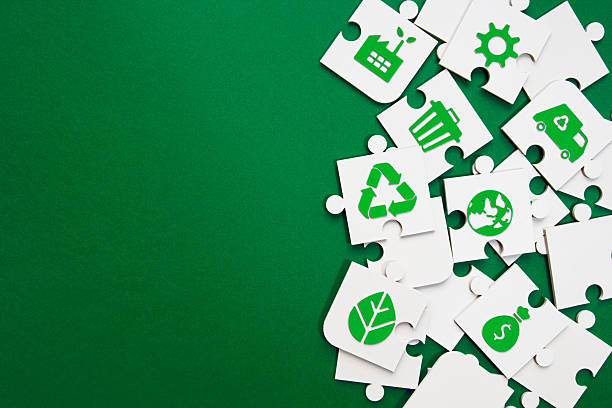 istock Environmental Puzzle Pieces with Green Icons and Copy Space 2211308425