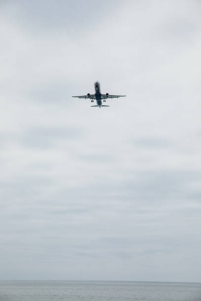 istock A passenger plane flying in the clouds in the sky 2211310303