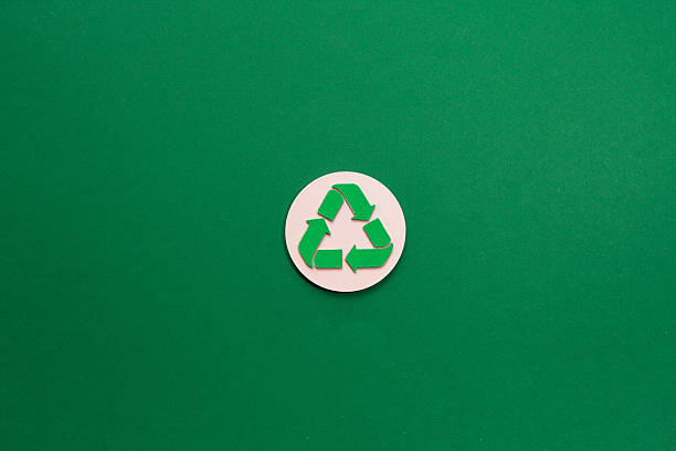 istock Recycle Symbol on Green Background 2211311594
