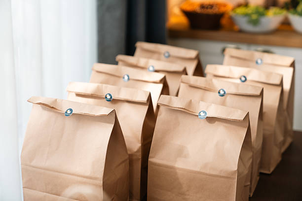 istock Eco-Friendly Recycling, Sustainable Cardboard Boxes and Biodegradable Containers for Packaging Organic Products, Shopping Bags, food, Designed with Green, Environmental Approach for the Market 2211312766