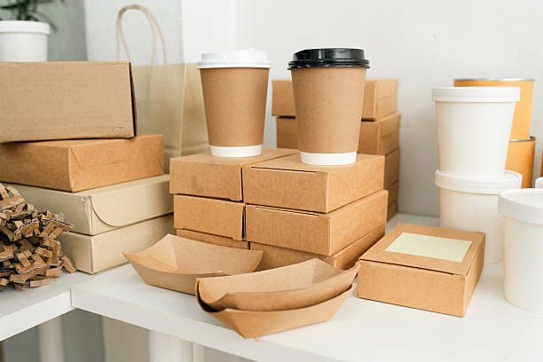 istock Eco-Friendly Recycling, Sustainable Cardboard Boxes and Biodegradable Containers for Packaging Organic Products, Shopping Bags, food, Designed with Green, Environmental Approach for the Market 2211312793