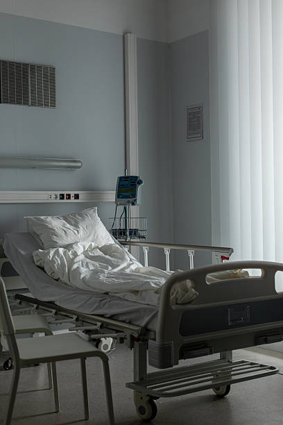 istock An empty hospital room with a bed and natural light, creating a serene space for recovery 2211314537