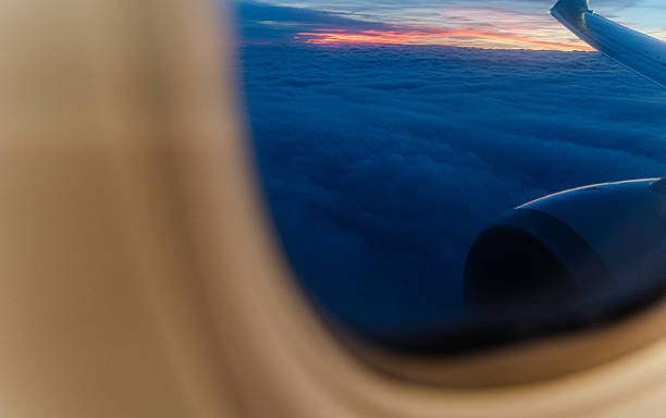 istock View from above. Sunset from the airplane window. 2211314999