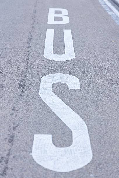 istock inscription on the asphalt bus 2211321576