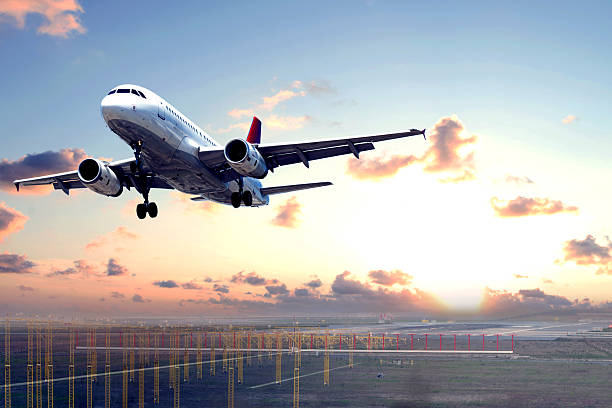 istock Passenger airplane Take off at sunset 2211322027