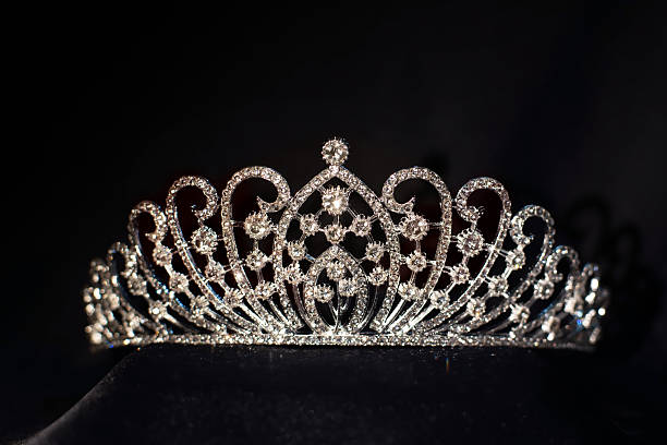 istock Royal crown with diamond on black background 2211324877