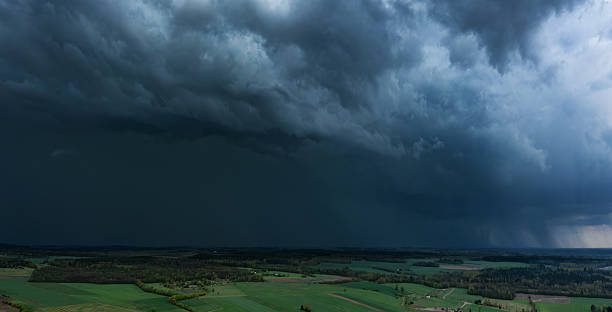 istock Storm clouds over field, tornadic supercell, extreme weather, dangerous storm, climate change 2211334007