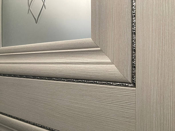 istock Image shows a corner of an interior space with flexible modular wall panels and a decorative ceiling border, in neutral tones, without any branding or texts 2211342819