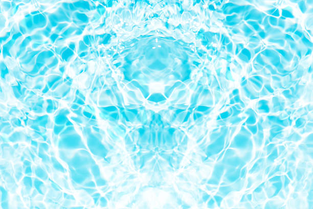 blue water in a pool. the water are clear and there are some small ripples and reflections