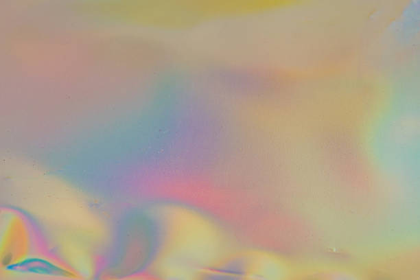 Artistic image with a color gradient, transitioning from warm yellows to cool purples Soft, misty appearance gives it an ethereal quality, suitable for marketing and advertising themes like light, e