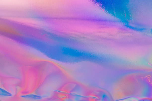 istock An abstract image featuring a fluid transition of purple to pink colors, suitable for creative marketing campaigns evoking evolution and blending concepts 2211346087