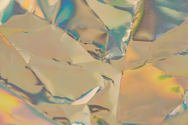 istock An abstract image of a faceted, metallic crystalline structure with multiple reflective surfaces and soft pastel background fades, suggesting depth and futuristic appeal 2211346137