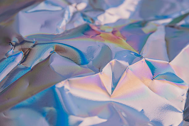 istock Microscopic image of vibrant, iridescent crystalline substance 2211346155
