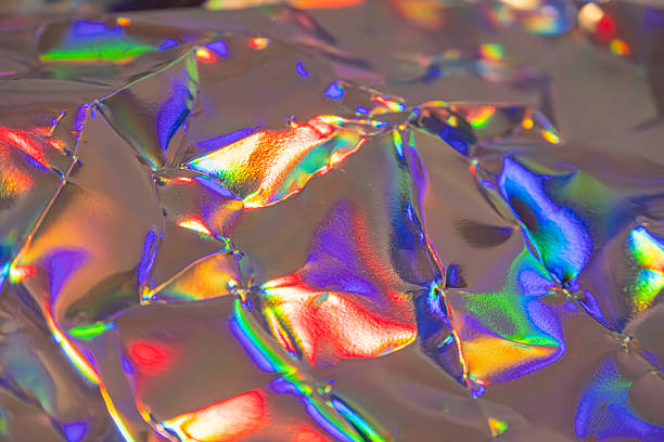 istock High-resolution abstract image showcasing a shattered glass or crystalline structure, reflecting a spectrum of colors Suited for marketing campaigns conveying energy and artistic flair 2211346226