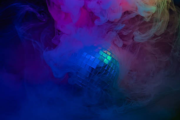 istock A lively image with neon smoke, a disco ball creating dynamic lighting effects for nightlife events such as parties or clubs 2211346434
