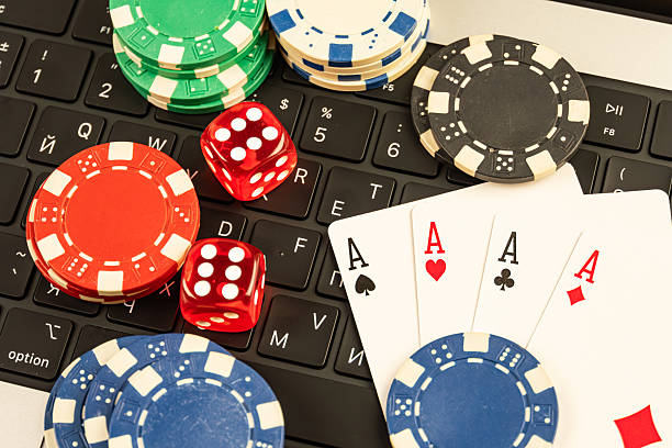istock Image of casino items playing cards, dice, chips, cards deck on a table or gaming surface for promotional use in casinos, online gambling platforms, poker tournaments 2211346600