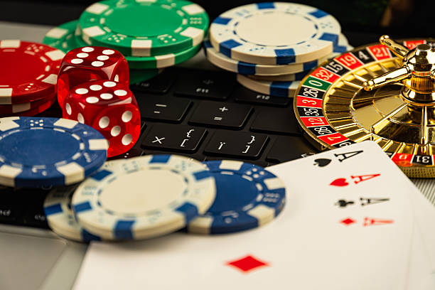 istock Striking image showcasing casino chips, aces, and roulette wheel, symbolizing gaming excitement and glamour 2211346661