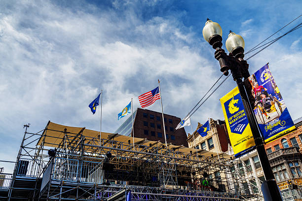 Boston, Massachusetts, USA - April 18, 2025: Low angle view of  the 129th Boston Marathon's official viewing stand across the Finish Line on Boylston Street in Copley Square. The marathon is always run on the Patriots' Day holiday, April 21th for 2025.