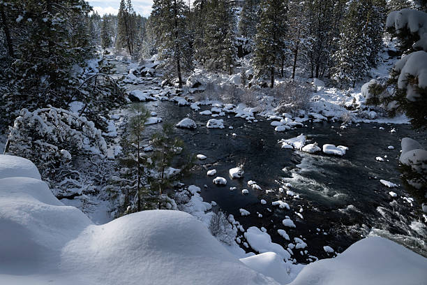Snow covered river banks near Bend, Oregon