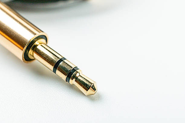 istock A close-up image of a gold fountain pen on a textured white surface, emphasizing its elegant design, high-quality materials, and durability 2211348437