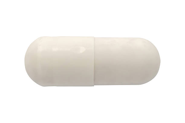 istock White medicine pill capsule isolated on white background 2211348631