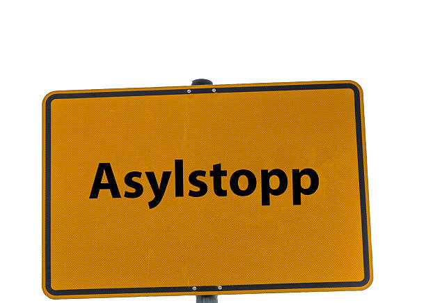 istock Sign isolated asylum stop german 