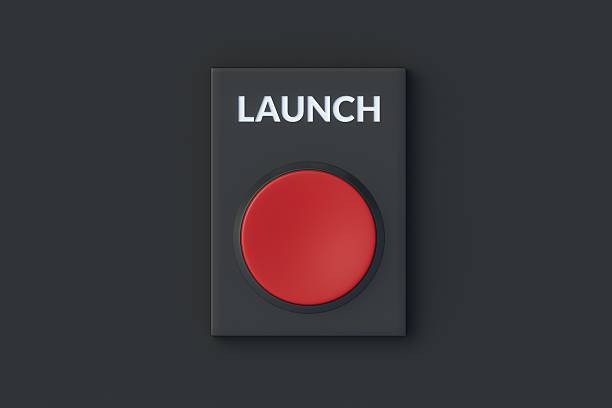 Launch word on red button on black background. Nuclear weapons. Start new business. Top view. 3d render